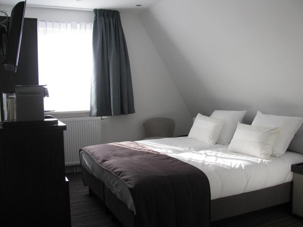 Boutique Hotel De Zwaluw De Koog  Δωμάτιο φωτογραφία